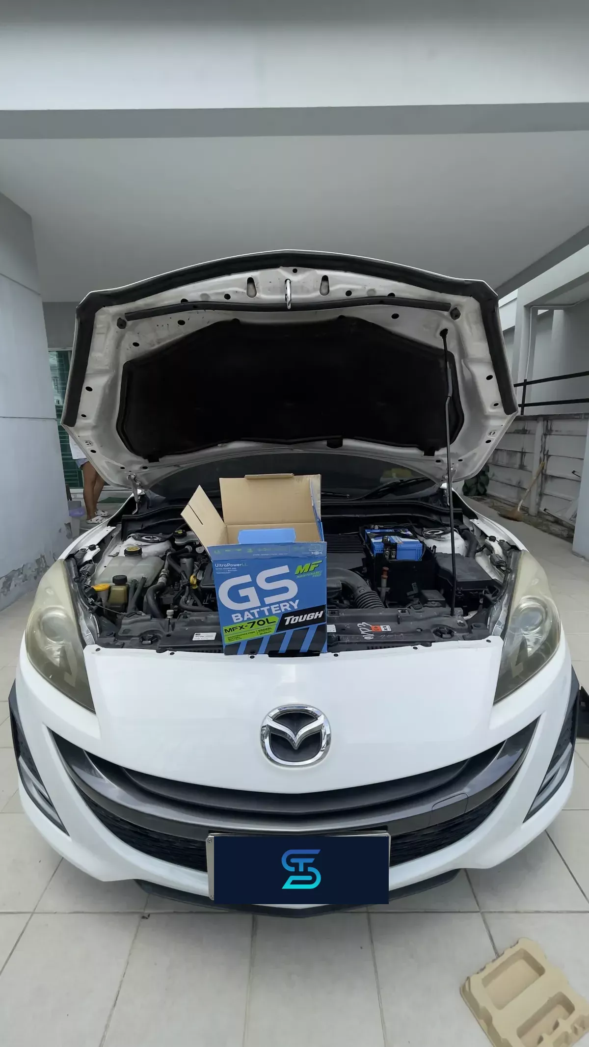 ติดตั้งแบตเตอรี่ GS MFX70L รถ MAZDA Mazda 3 1.6, 2.0 ที่ หมู่บ้านเดอะวิสต้า เก้ากิโล โดย เอส.ที.แบตเตอรี่ ศรีราชา ชลบุรี